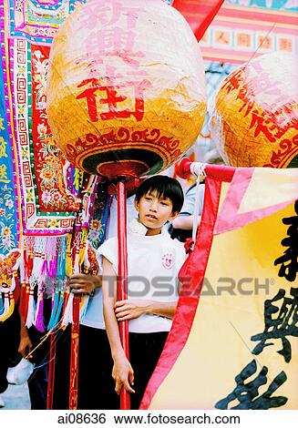 China, Hong Kong, Cheung Chau Island, Portrait of boy carrying a traditional lantern during the Bun Festival procession in 2000 View Large Photo Image Stock Photograph - China, Hong Kong, Cheung Chau Island, Portrait of boy carrying a traditional lantern during the Bun Festival procession in 2000. Fotosearch