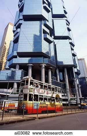 China, Hong Kong, Tram moving past building in Central Hong Kong View Large Photo Image Stock Image - China, Hong Kong, Tram moving past building in Central Hong Kong. Fotosearch