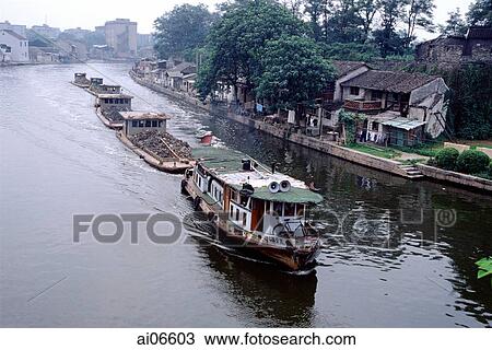 Stock Image -  China, Suzhou, barges on the Grand Canal. Fotosearch