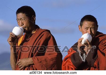 China, Szechuan (Sichuan), Kham region, Tibetan monks blowing on conch shells as a prayer call during the summer nomad festival. View Large Photo Image Picture - China, Szechuan (Sichuan), Kham region, Tibetan monks blowing on conch shells as a prayer call during the summer nomad festival.. Fotosearch
