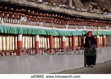 China, Szechuan (Sichuan), Kham region, Tibetan woman making kora ( pilgrimage) at monastery. View Large Photo Image Stock Image - China, Szechuan (Sichuan), Kham region, Tibetan woman making kora ( pilgrimage) at monastery.. Fotosearch