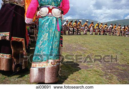 Stock Image - China, Szechuan (Sichuan), Kham region, Khampa men and women in full traditional costumes at the summer nomad festival.. Fotosearch