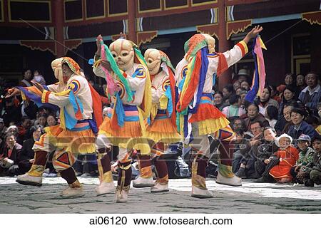 Stock Image - China, Szechuan (Sichuan), Kham region, Lamastic dancers performing masked lama dance at monastery. Fotosearch