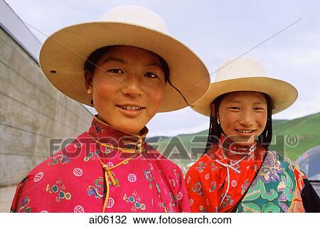China, Szechuan (Sichuan), Kham region, Khampa women in traditional dress and hats. View Large Photo Image Stock Image - China, Szechuan (Sichuan), Kham region, Khampa women in traditional dress and hats.. Fotosearch
