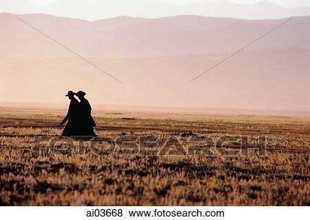 China, Szechuan (Sichuan), Kham region, Tibetan monks walk along the grasslands in the early morning. View Large Photo Image Stock Photo - China, Szechuan (Sichuan), Kham region, Tibetan monks walk along the grasslands in the early morning.. Fotosearch