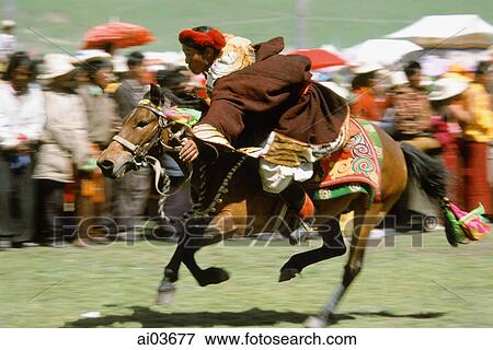 China, Szechuan (Sichuan), Kham region, A Khampa horseman shows off his skills at the summer nomad festival. View Large Photo Image Stock Photo - China, Szechuan (Sichuan), Kham region, A Khampa horseman shows off his skills at the summer nomad festival.. Fotosearch
