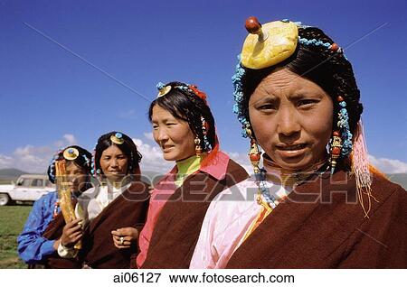 China, Szechuan (Sichuan), Kham region, Nomad women with traditional decorations of silver, turquoise and coral plaited into their hair. View Large Photo Image Stock Photo - China, Szechuan (Sichuan), Kham region, Nomad women with traditional decorations of silver, turquoise and coral plaited into their hair.. Fotosearch