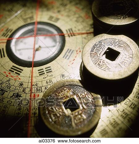 Close up of Chinese coins on a Luo Pan (Lo P'an), Feng Shui compass View Large Photo Image Stock Photograph - Close up of Chinese coins on a Luo Pan (Lo P'an), Feng Shui compass. Fotosearch