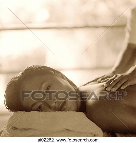 Close up of woman getting a massage View Large Photo Image Stock Image - Close up of woman getting a massage. Fotosearch