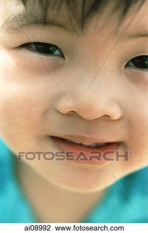 Close-up of young boy View Large Photo Image Stock Image - Close-up of young boy. Fotosearch