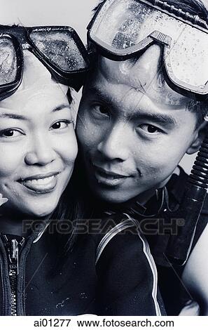 Couple in scuba gear, portrait View Large Photo Image Stock Photo - Couple in scuba gear, portrait. Fotosearch