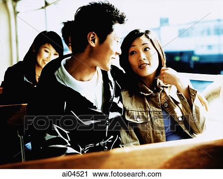 Couple sitting and talking on ferry. View Large Photo Image Stock Image - Couple sitting and talking on ferry.. Fotosearch