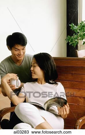 Couple talking at home View Large Photo Image Stock Image - Couple talking at home. Fotosearch
