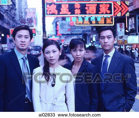 Executives standing in a row, busy street in background, portrait. View Large Photo Image Stock Image - Executives standing in a row, busy street in background, portrait.. Fotosearch