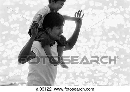 Father and son wading in water, son on father's shoulders View Large Photo Image Stock Image - Father and son wading in water, son on father's shoulders. Fotosearch
