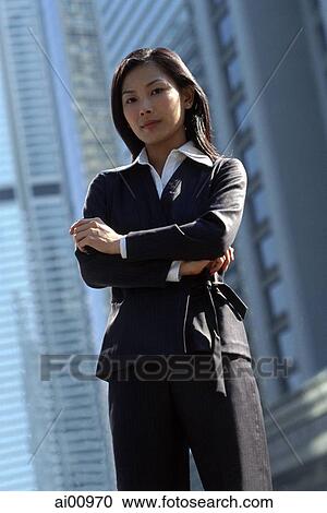 Female executive standing, portrait View Large Photo Image Stock Image - Female executive standing, portrait. Fotosearch