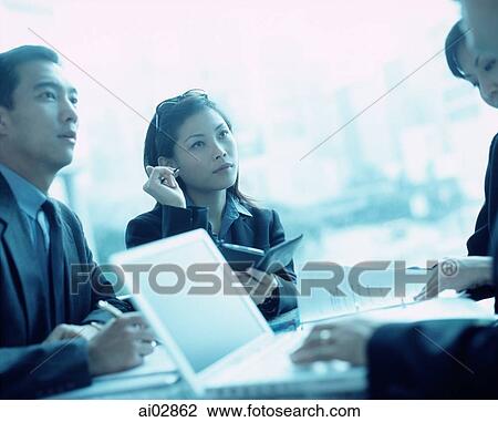 Female executive using PDA, male executive next to her. View Large Photo Image Stock Image - Female executive using PDA, male executive next to her.. Fotosearch