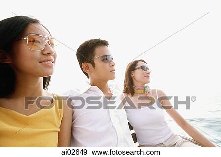 Group of friends relaxing View Large Photo Image Stock Photo - Group of friends relaxing. Fotosearch