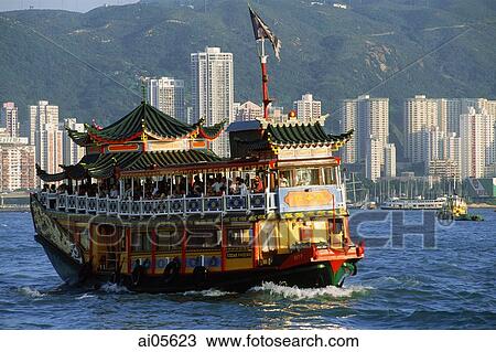 Hong Kong, Victoria Harbor, Double-decker boat, buildings in background. View Large Photo Image Stock Image - Hong Kong, Victoria Harbor, Double-decker boat, buildings in background.. Fotosearch