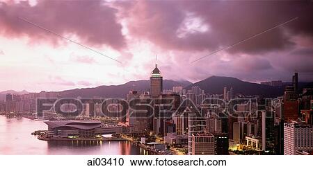 Hong Kong, Wanchai, View of Wanchai North at sunrise showing the Hong Kong Convention and Exhibition Centre, and Central Plaza. View Large Photo Image Stock Image - Hong Kong, Wanchai, View of Wanchai North at sunrise showing the Hong Kong Convention and Exhibition Centre, and Central Plaza.. Fotosearch