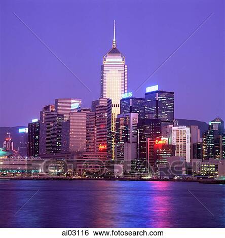 Stock Photograph - Hong Kong, Wanchai, View of Wanchai North at dusk, showing Central Plaza.. Fotosearch