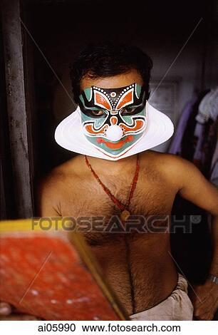 India, Cochin, Kathakali dancer checking make up View Large Photo Image Stock Image - India, Cochin, Kathakali dancer checking make up. Fotosearch
