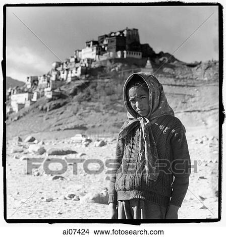 India, Ladakh, Portrait of young girl, monastery at background. View Large Photo Image Picture - India, Ladakh, Portrait of young girl, monastery at background.. Fotosearch