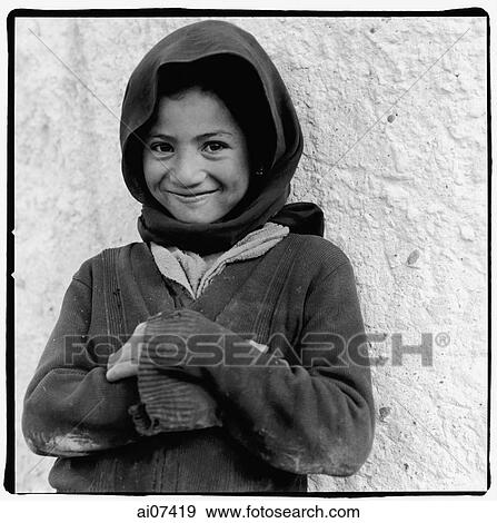 India, Ladakh, Portrait of young girl arms crossed, smiling. View Large Photo Image Stock Photo - India, Ladakh, Portrait of young girl arms crossed, smiling.. Fotosearch