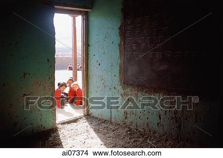 India, Ladakh, School girls sitting in front of doorway of classroom. View Large Photo Image Picture - India, Ladakh, School girls sitting in front of doorway of classroom.. Fotosearch