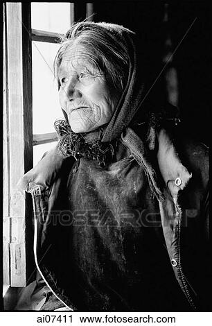 India, Ladakh, Small village near Leh, Elderly lady looking out of window. View Large Photo Image Stock Image - India, Ladakh, Small village near Leh, Elderly lady looking out of window.. Fotosearch