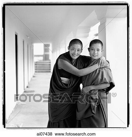 Stock Photo - India, near Dharamsala, Dolma Ling Nunnery, Portrait of Tibetan nuns.. Fotosearch