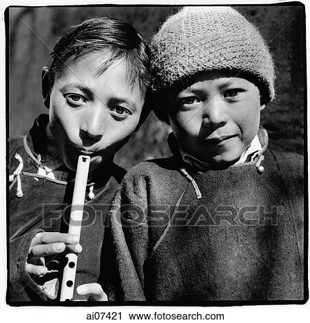 India, Northern India, Srinagar-Leh Road, Portrait of two young boys, one playing recorder. View Large Photo Image Stock Image - India, Northern India, Srinagar-Leh Road, Portrait of two young boys, one playing recorder.. Fotosearch