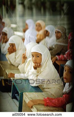 Indonesia, Aceh, Across Muslim Southeast Asia, parents have turned to Islamic schools like this one in the rebellious province of Aceh to inoculate their children against Western values. View Large Photo Image Picture - Indonesia, Aceh, Across Muslim Southeast Asia, parents have turned to Islamic schools like this one in the rebellious province of Aceh to inoculate their children against Western values.. Fotosearch