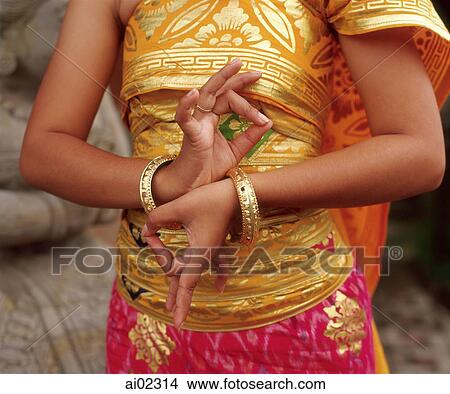 Indonesia, Bali, Balinese dancer in traditional costume, close-up of hands View Large Photo Image Picture - Indonesia, Bali, Balinese dancer in traditional costume, close-up of hands. Fotosearch