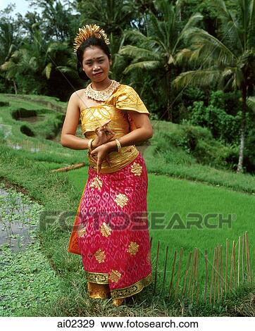 Indonesia, Bali, Balinese dancer in padi fields View Large Photo Image Stock Photo - Indonesia, Bali, Balinese dancer in padi fields. Fotosearch