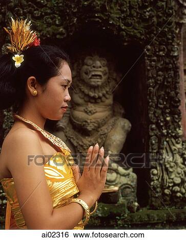 Indonesia, Bali, Balinese dancer in traditional costume, upper torso View Large Photo Image Stock Photograph - Indonesia, Bali, Balinese dancer in traditional costume, upper torso. Fotosearch