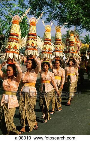Indonesia, Bali, Gianyar, Cremation ceremony, women carrying offerings. (grainy) View Large Photo Image Stock Image - Indonesia, Bali, Gianyar, Cremation ceremony, women carrying offerings. (grainy). Fotosearch