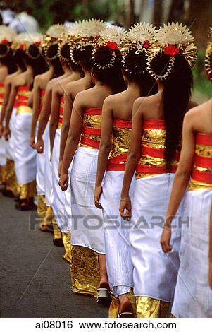 Indonesia, Bali, Gianyar, Cremation ceremony, procession of teenage girls. (grainy) View Large Photo Image Stock Photograph - Indonesia, Bali, Gianyar, Cremation ceremony, procession of teenage girls. (grainy). Fotosearch