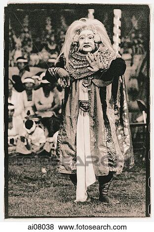 Indonesia, Bali, Gianyar, Mask (Topeng) dancer performing in temple grounds. (artistic grain) View Large Photo Image Stock Photo - Indonesia, Bali, Gianyar, Mask (Topeng) dancer performing in temple grounds. (artistic grain). Fotosearch