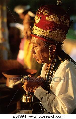 Indonesia, Bali, Gianyar, Pengastian ceremony, high priest leads communal prayers. (grainy) View Large Photo Image Picture - Indonesia, Bali, Gianyar, Pengastian ceremony, high priest leads communal prayers. (grainy). Fotosearch