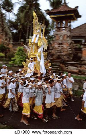 Indonesia, Bali, Gianyar, Pengastian ceremony, men carrying ceremonial tower to sea. (grainy) View Large Photo Image Stock Image - Indonesia, Bali, Gianyar, Pengastian ceremony, men carrying ceremonial tower to sea. (grainy). Fotosearch