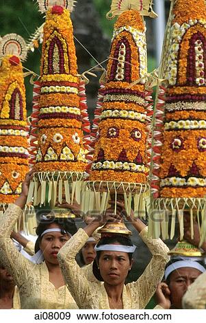 Indonesia, Bali, Gianyar, Pengastian ceremony, women carrying offerings. (grainy) View Large Photo Image Stock Photo - Indonesia, Bali, Gianyar, Pengastian ceremony, women carrying offerings. (grainy). Fotosearch