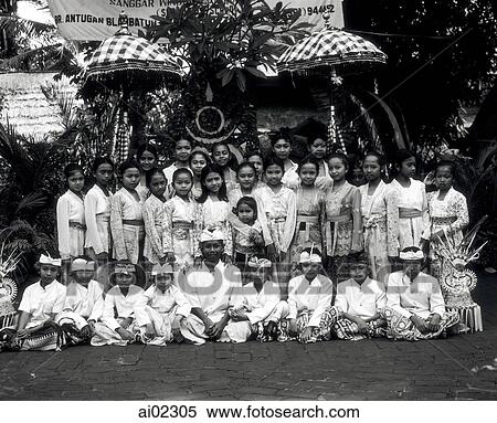 Indonesia, Bali, group portrait of children in traditional costume View Large Photo Image Stock Photography - Indonesia, Bali, group portrait of children in traditional costume. Fotosearch
