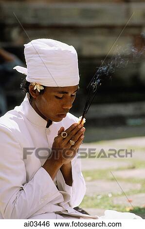 Indonesia, Bali, Hindu priest praying. View Large Photo Image Stock Photograph - Indonesia, Bali, Hindu priest praying.. Fotosearch