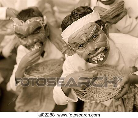Indonesia, Bali, men in traditional masks, portrait View Large Photo Image Stock Photo - Indonesia, Bali, men in traditional masks, portrait. Fotosearch