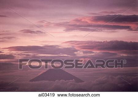 Stock Photo - Indonesia, Bali, Sunset at Mt. Agung, view from Lombok. Fotosearch