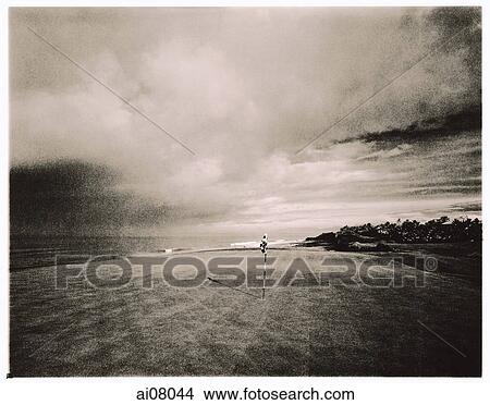 Indonesia, Bali, Tanah Lot, 13th green towards Indian Ocean Nirwana Bali Golf Club. ( artistic grain) View Large Photo Image Picture - Indonesia, Bali, Tanah Lot, 13th green towards Indian Ocean Nirwana Bali Golf Club. ( artistic grain). Fotosearch