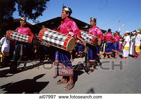 Indonesia, Bali, Tanjung Benoa, Drum players at Melasti ceremony. (grainy) View Large Photo Image Stock Photo - Indonesia, Bali, Tanjung Benoa, Drum players at Melasti ceremony. (grainy). Fotosearch