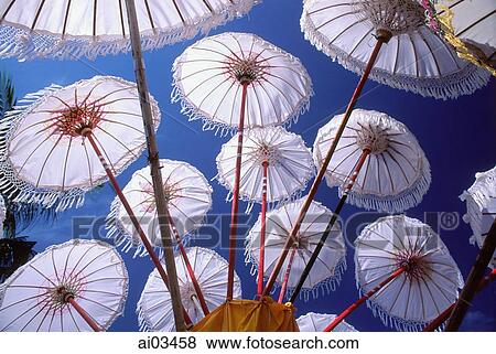 Indonesia, Bali, Temple umbrellas at festival View Large Photo Image Stock Photo - Indonesia, Bali, Temple umbrellas at festival. Fotosearch