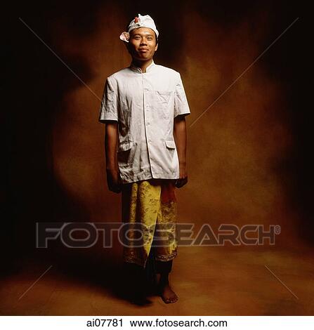 Indonesia, Bali, Ubud, Young Balinese man in temple dress. View Large Photo Image Stock Image - Indonesia, Bali, Ubud, Young Balinese man in temple dress.. Fotosearch